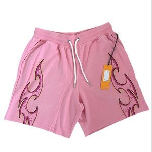 Athletic Pink Shorts with Black Flame Design
